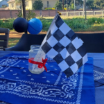 Blue overlay with racing flag as table decoration