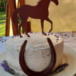 Birthday cake with horse and horsehoe detail with lavender baked by Hap & Hop Padstal